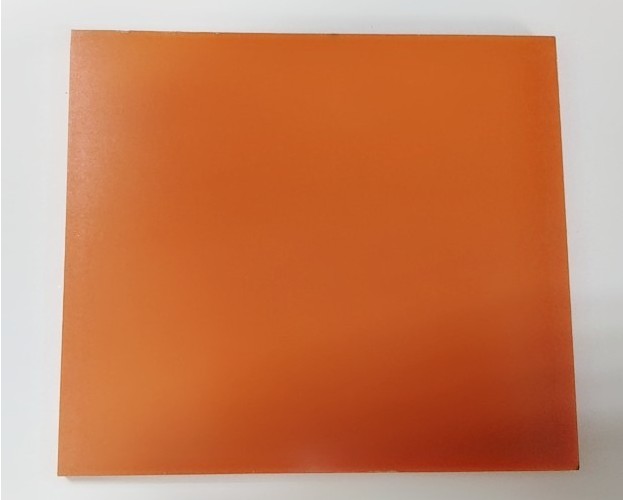 orange Bakelite plate